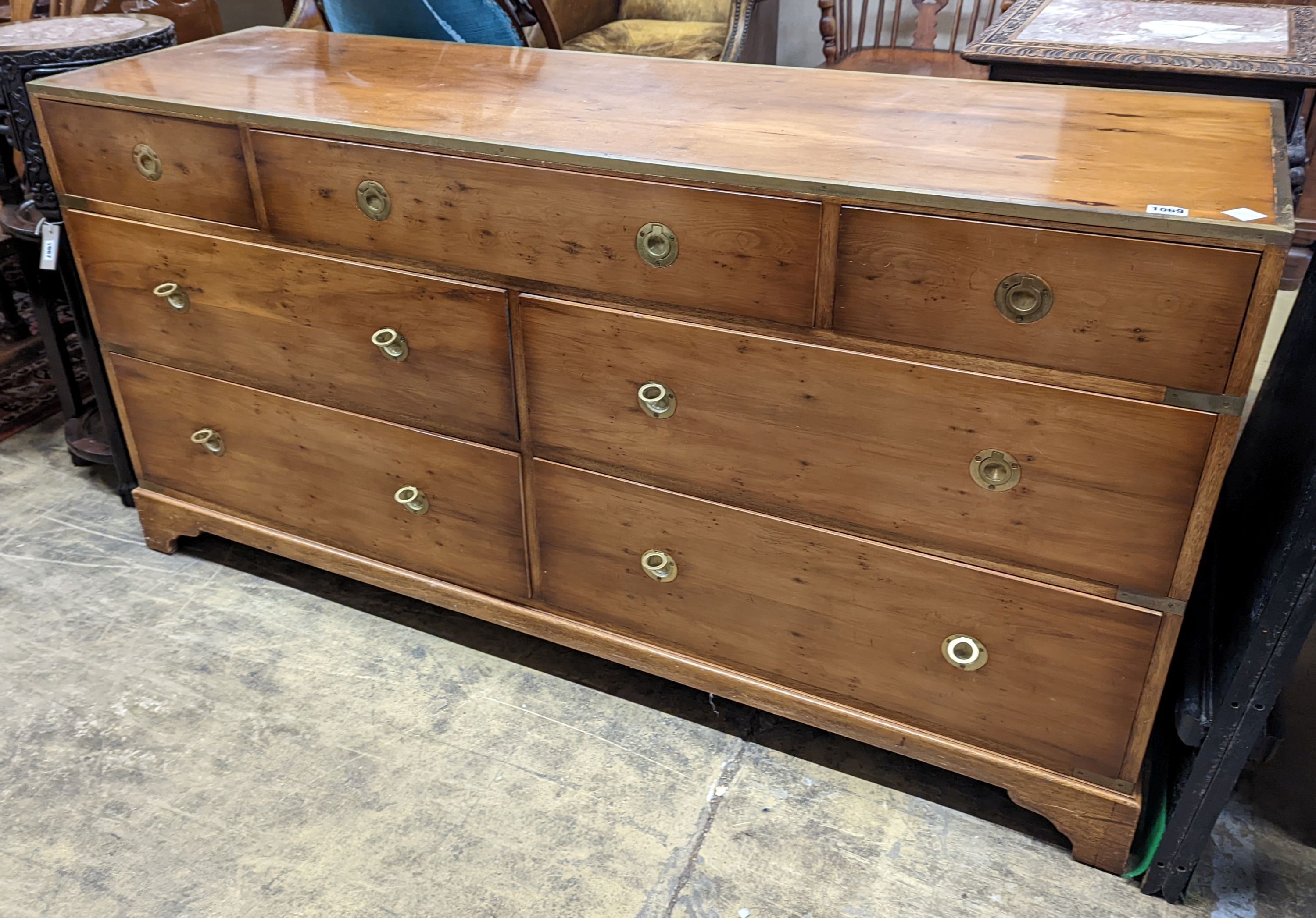 A reproduction brass mounted Military style yew veneered chest, width 153cm depth 46cm height 78cm